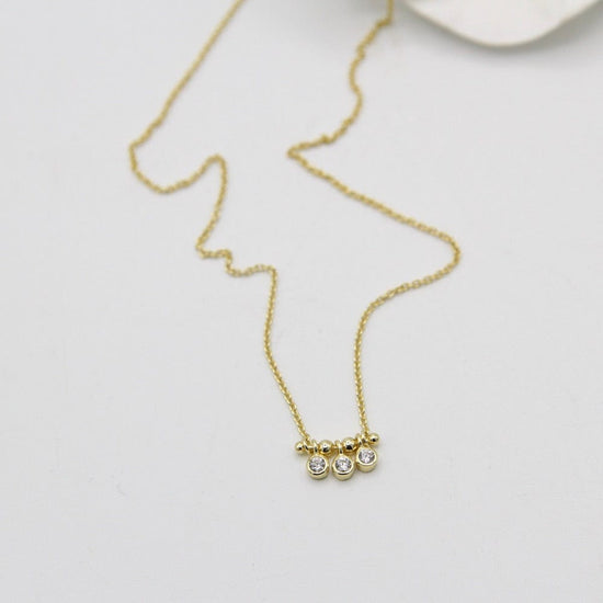 NKL-GPL Gold Shimmer Triple Stud Necklace