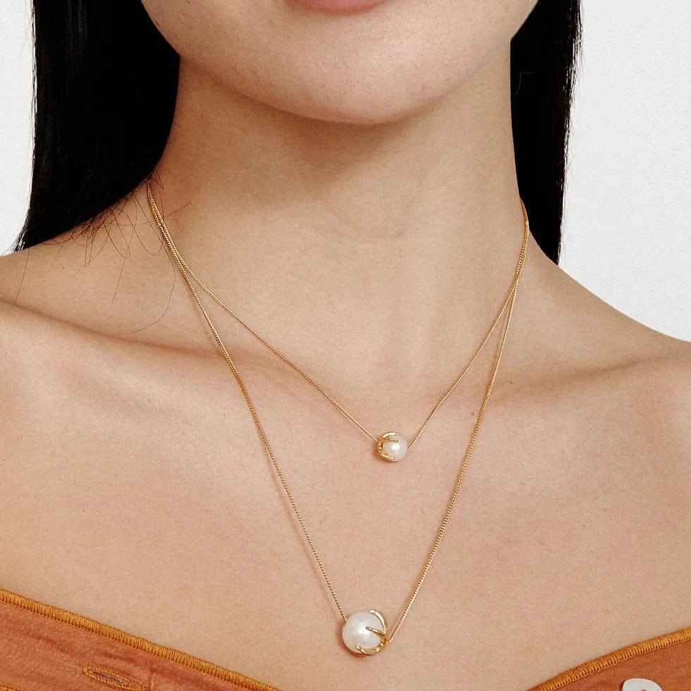 
                      
                        NKL-GPL Large Lark Necklace White Pearl
                      
                    