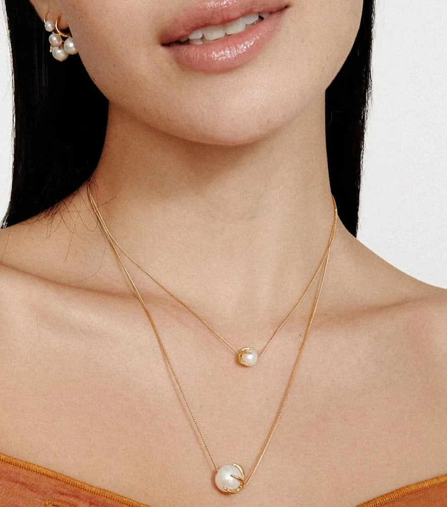 
                      
                        NKL-GPL Large Lark Necklace White Pearl
                      
                    