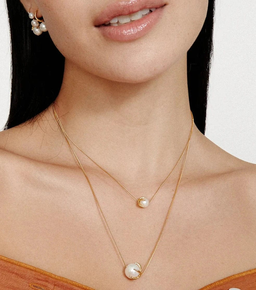 
                      
                        NKL-GPL Lark Necklace White Pearl
                      
                    