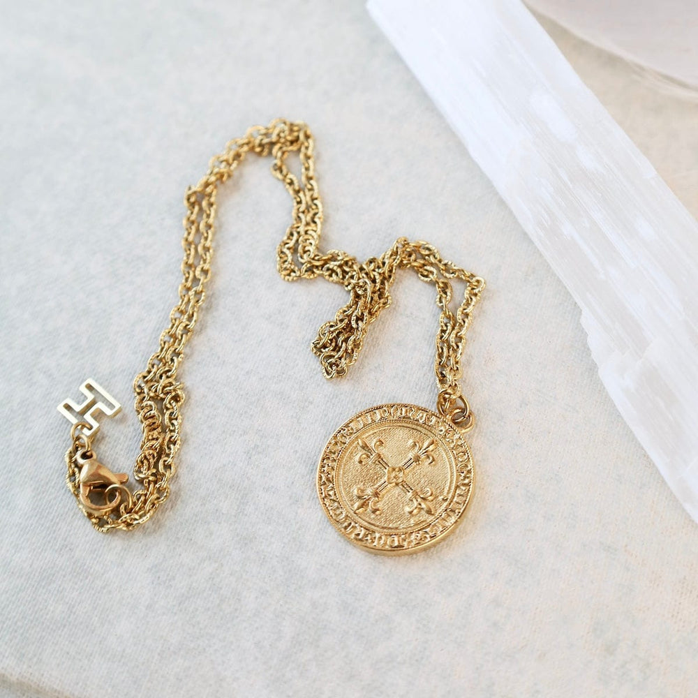 
                  
                    NKL-GPL NINA // The Little Gold Shield Necklace - 18k gold
                  
                