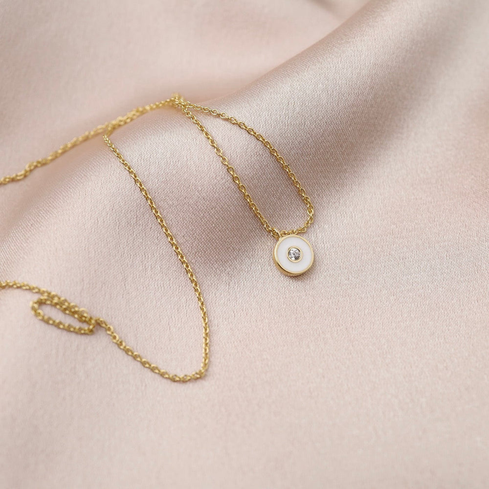 
                      
                        NKL-GPL Optic White Enamel Disc Gold Necklace
                      
                    