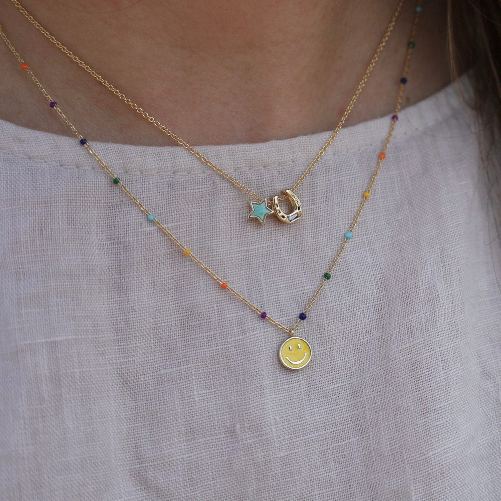 
                  
                    NKL-GPL Rainbow Epoxy Chain with Yellow Enamel Smily Face
                  
                