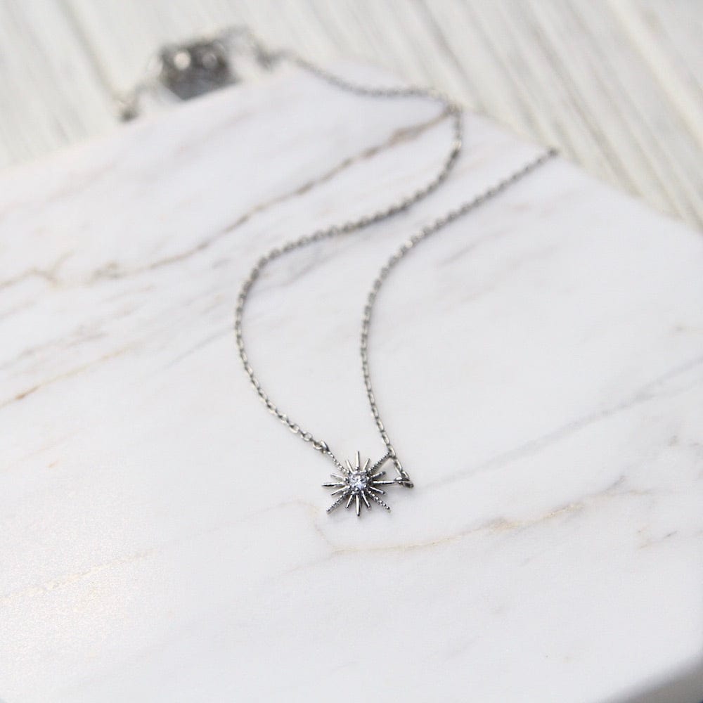 
                      
                        NKL-GPL Silver Starburst Choker
                      
                    