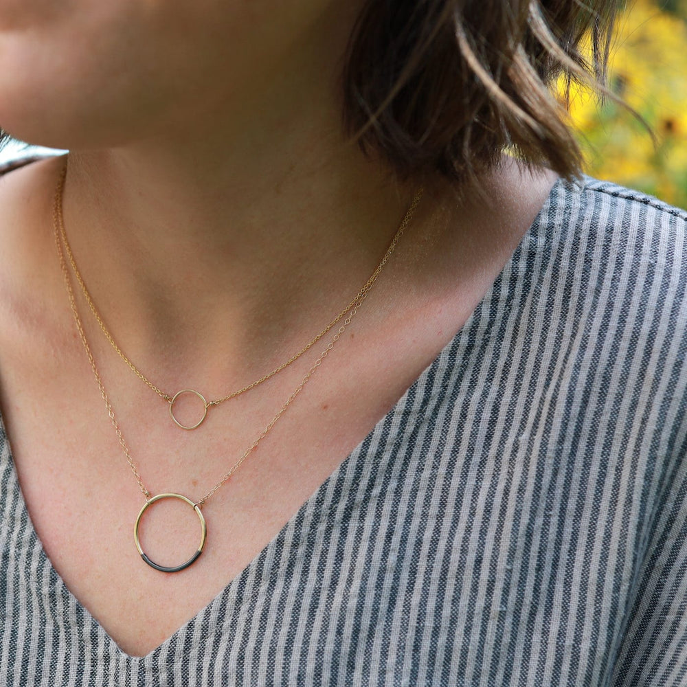 
                      
                        NKL-GPL Simple Rounded Square Necklace
                      
                    