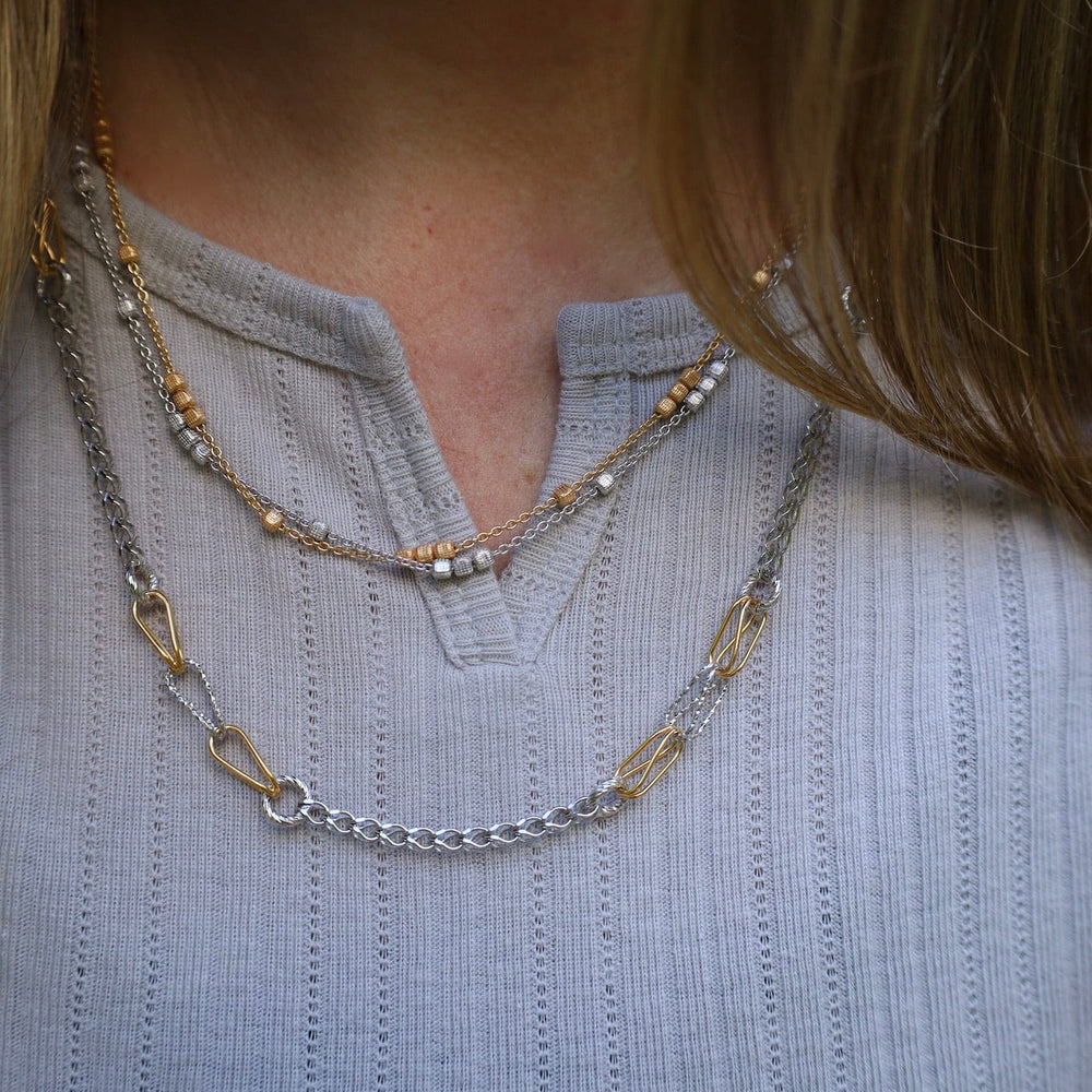 
                      
                        NKL-GPL Sterling Silver & Yellow Gold Plated Dani Necklace
                      
                    