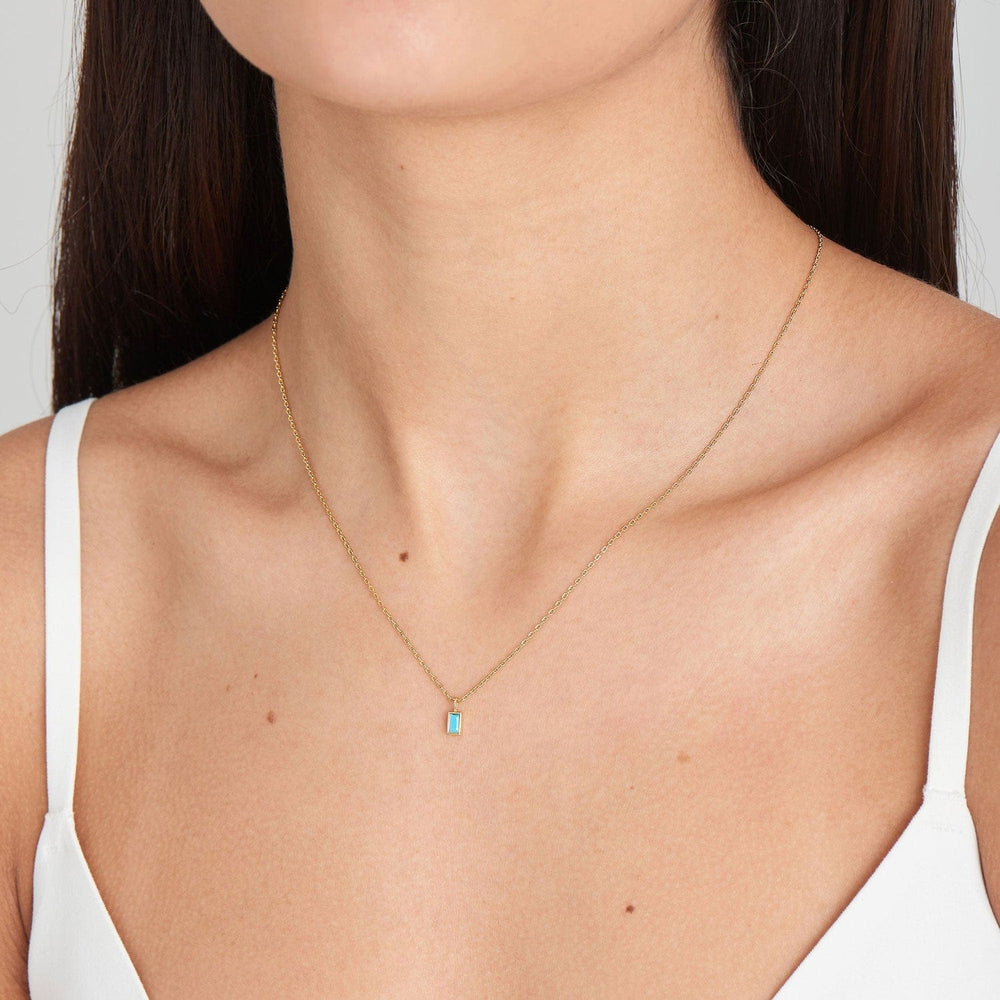 
                      
                        NKL-GPL Turquoise Drop Pendant Gold Necklace
                      
                    