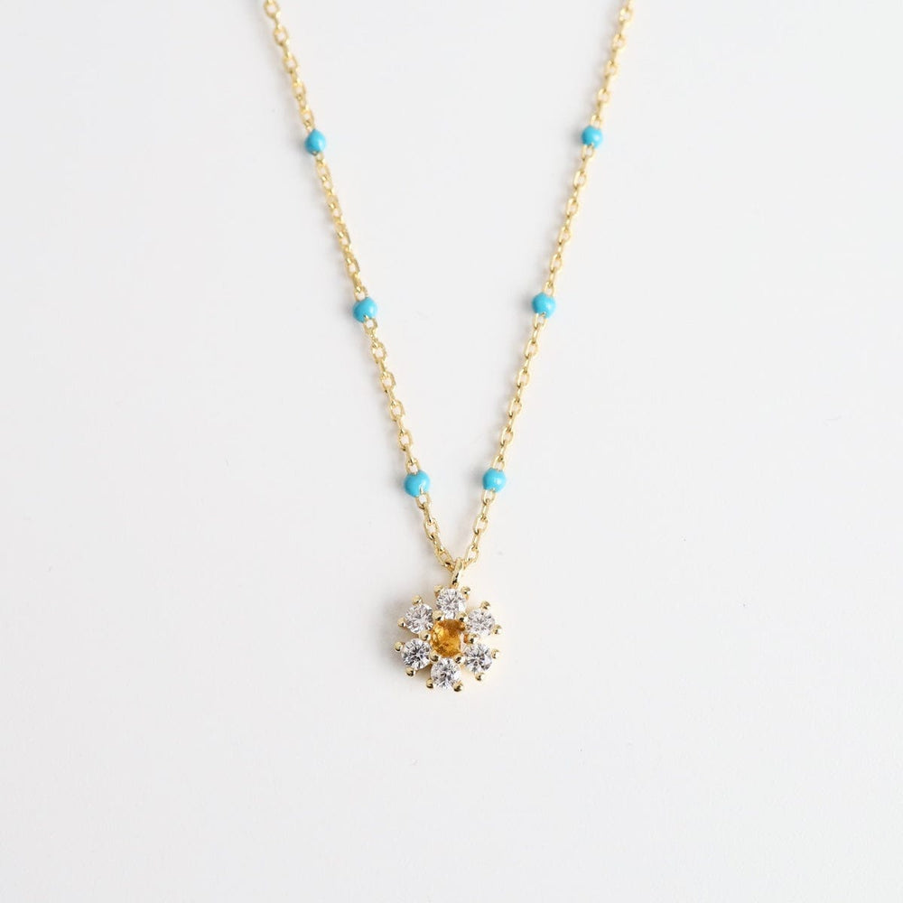 
                      
                        NKL-GPL Turquoise Epoxy Chain with CZ Flower Necklace
                      
                    