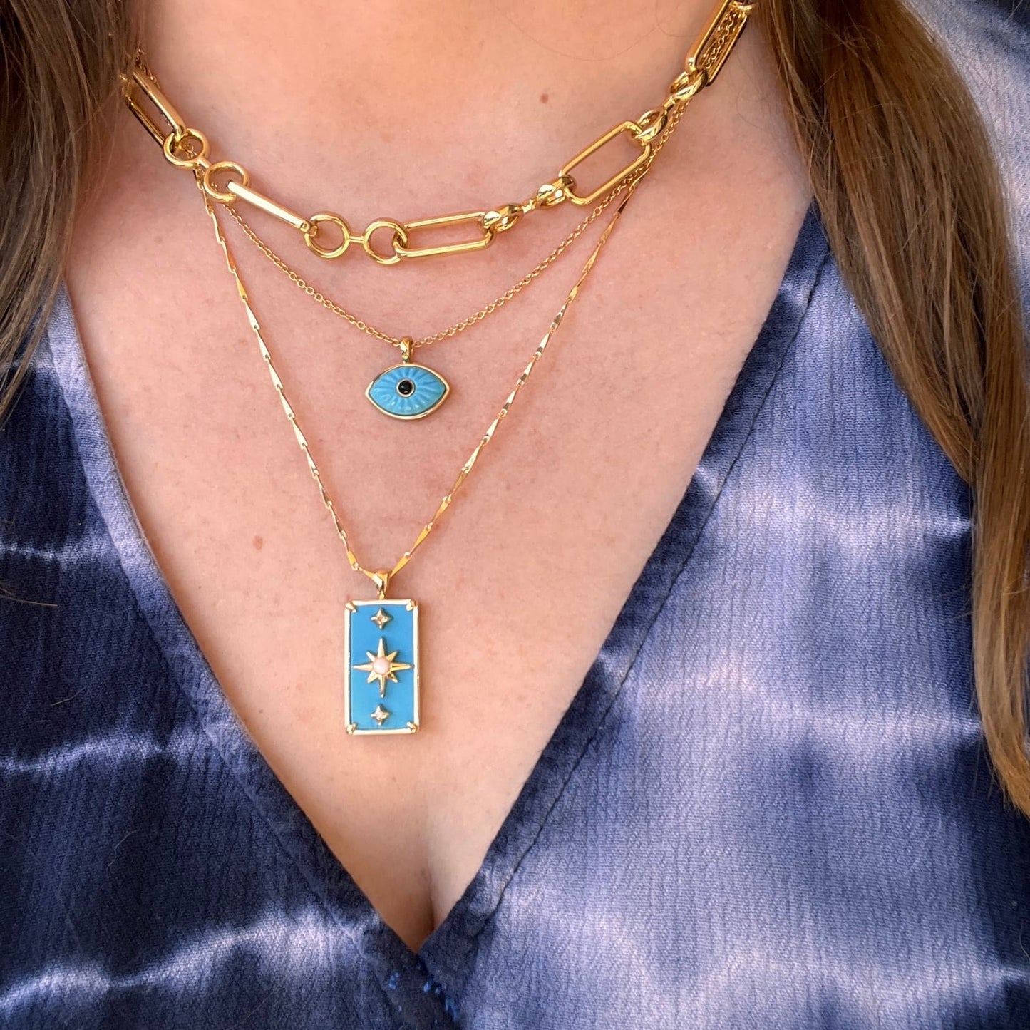 NKL-GPL Turquoise Starman Pendant Necklace