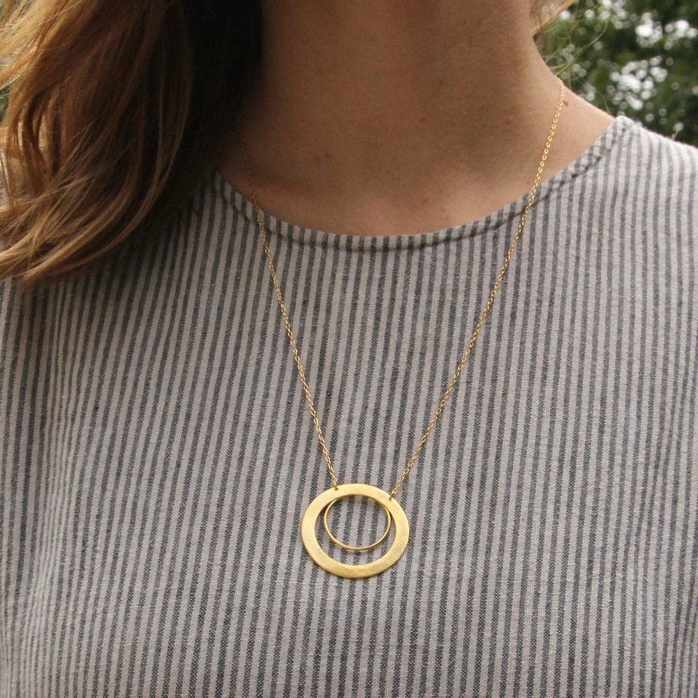 
                      
                        NKL-GPL Wide Flat Double Circle Necklace
                      
                    