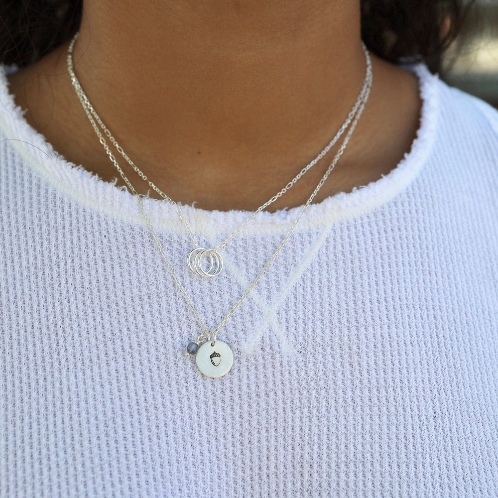 
                      
                        NKL Gratitude Necklace with Sterling Silver Rings
                      
                    