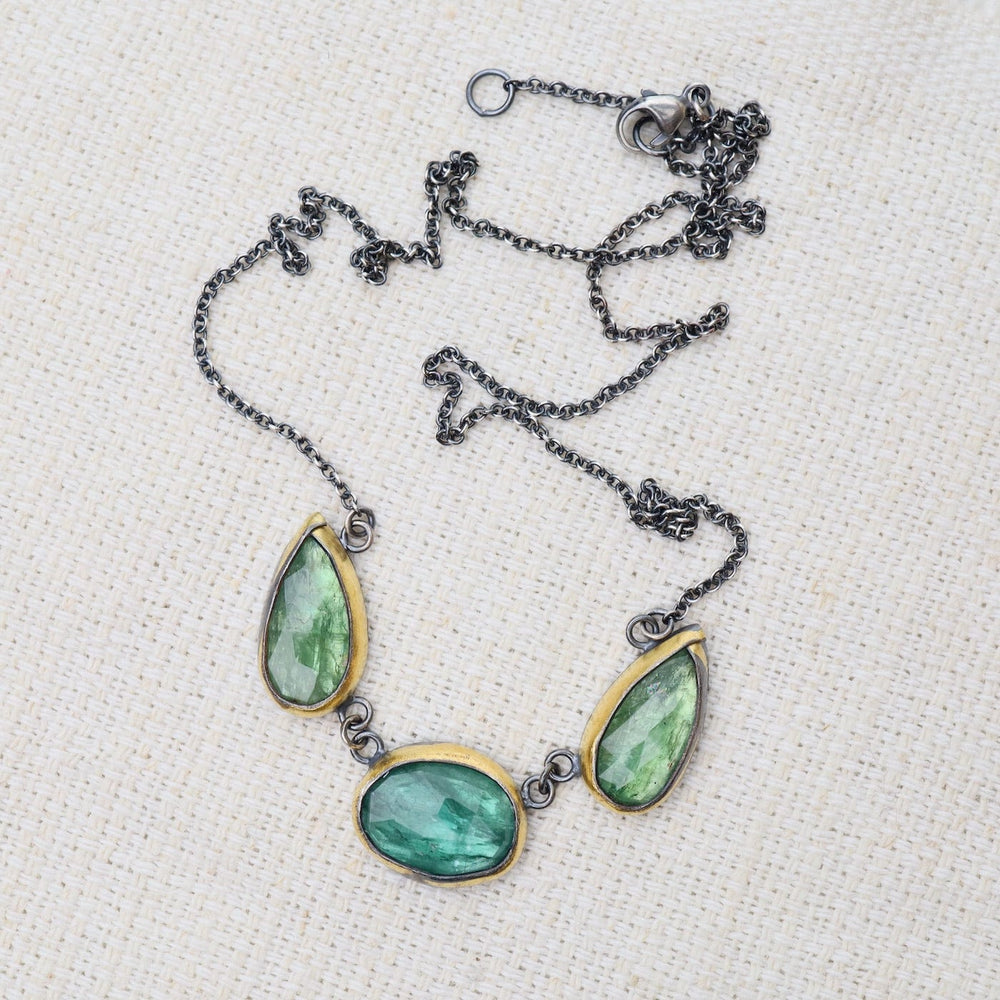 
                      
                        NKL Green Kyanite 3 Stone Teardrop & Oval Crescent Rim Necklace
                      
                    