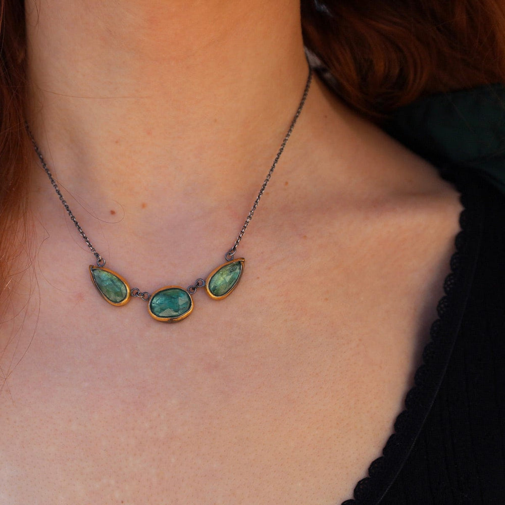 
                      
                        NKL Green Kyanite 3 Stone Teardrop & Oval Crescent Rim Necklace
                      
                    