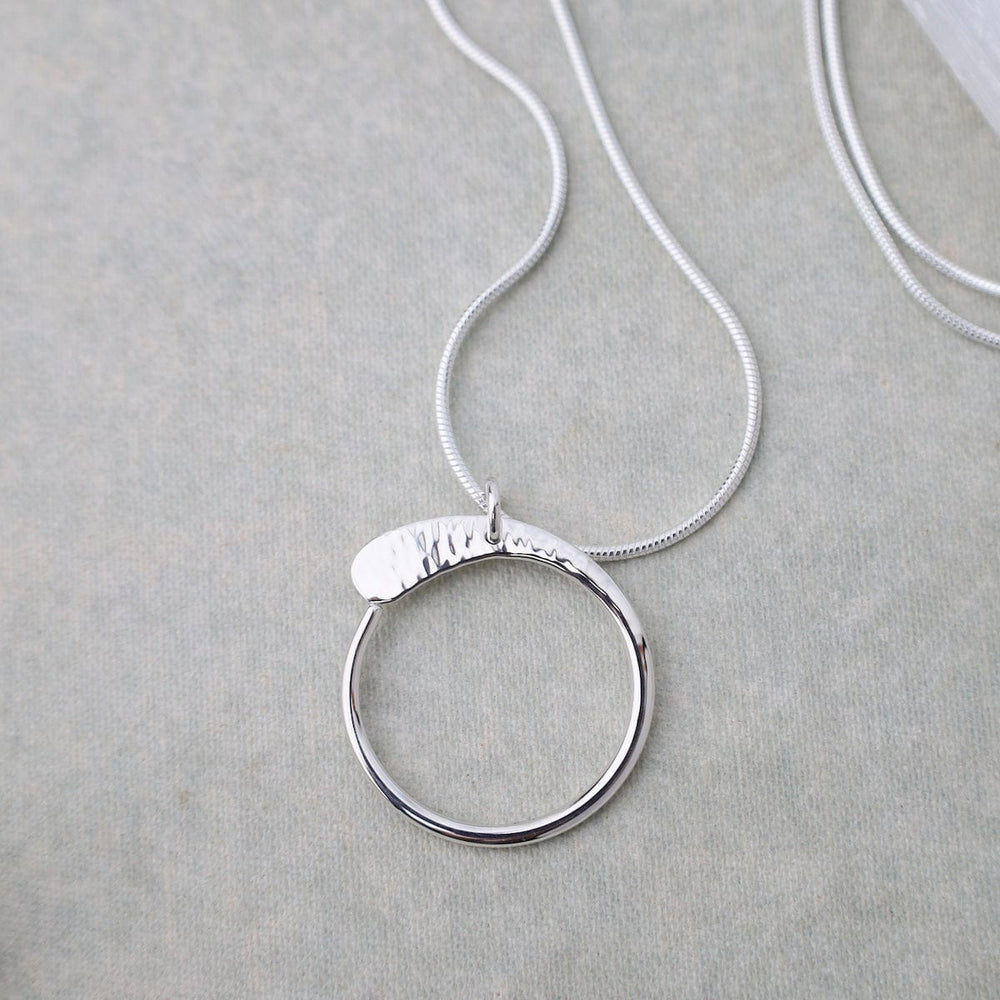 
                      
                        NKL Half Hammered Circle Pendant
                      
                    