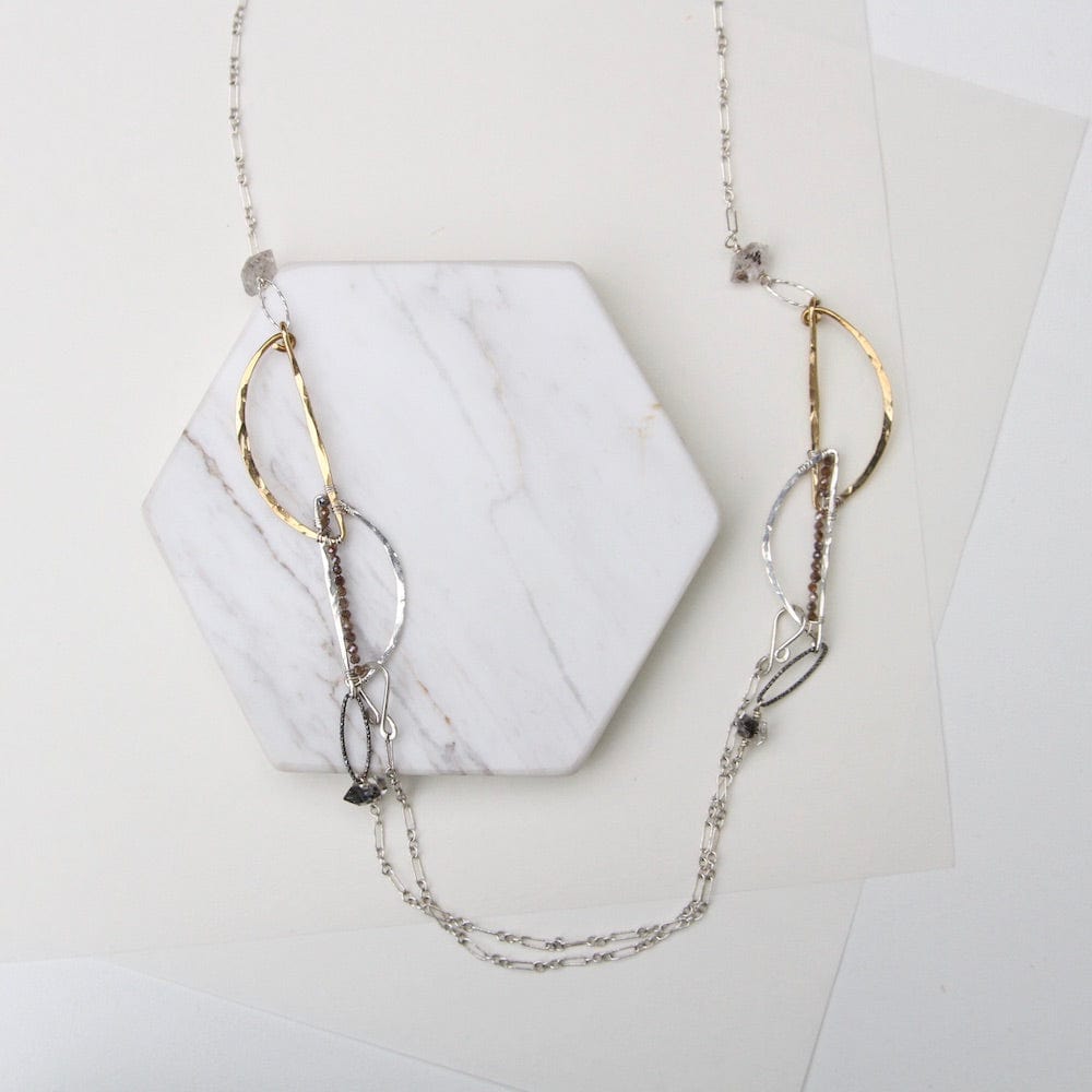 
                  
                    NKL Hand Formed Brass and Sterling Silver Herkimer Diamond Necklace
                  
                