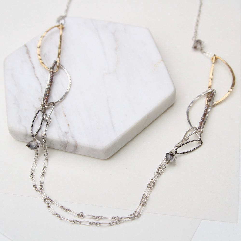 
                  
                    NKL Hand Formed Brass and Sterling Silver Herkimer Diamond Necklace
                  
                