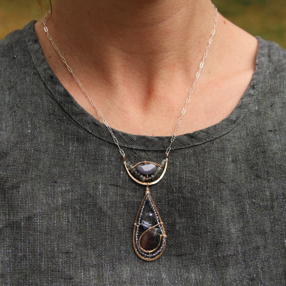 
                  
                    NKL Hand Formed Bronze Arc and Teardrop Necklace
                  
                