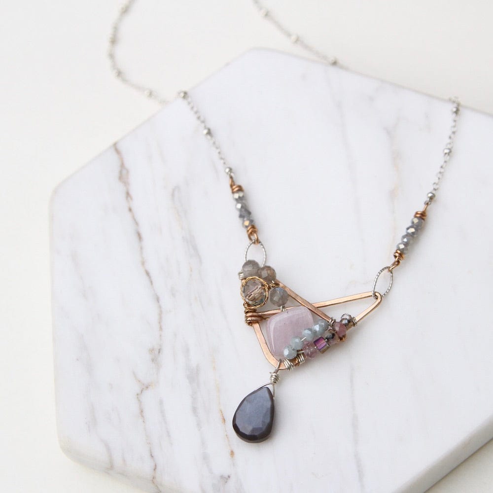 
                  
                    NKL Hand Formed Bronze Crossed Triangle Chocolate Moonstone Necklace
                  
                