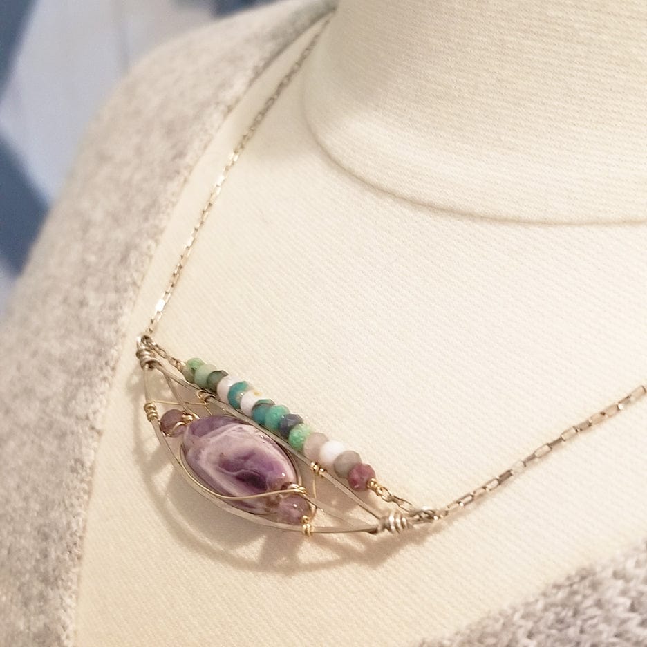 
                      
                        NKL HAND FORMED STERLING SILVER ARC WITH CAPE AMETHYST NECKLACE
                      
                    