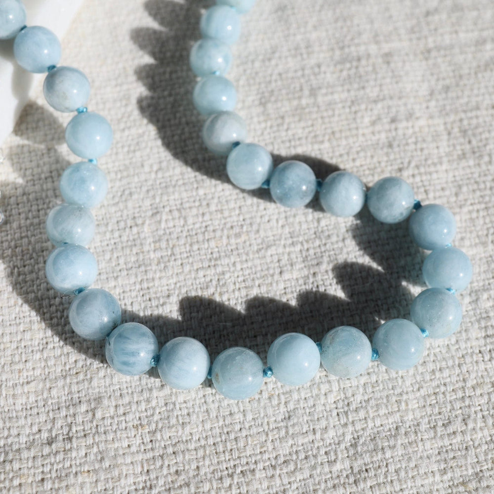 
                  
                    NKL Hand Knotted Milky Aquamarine Necklace
                  
                