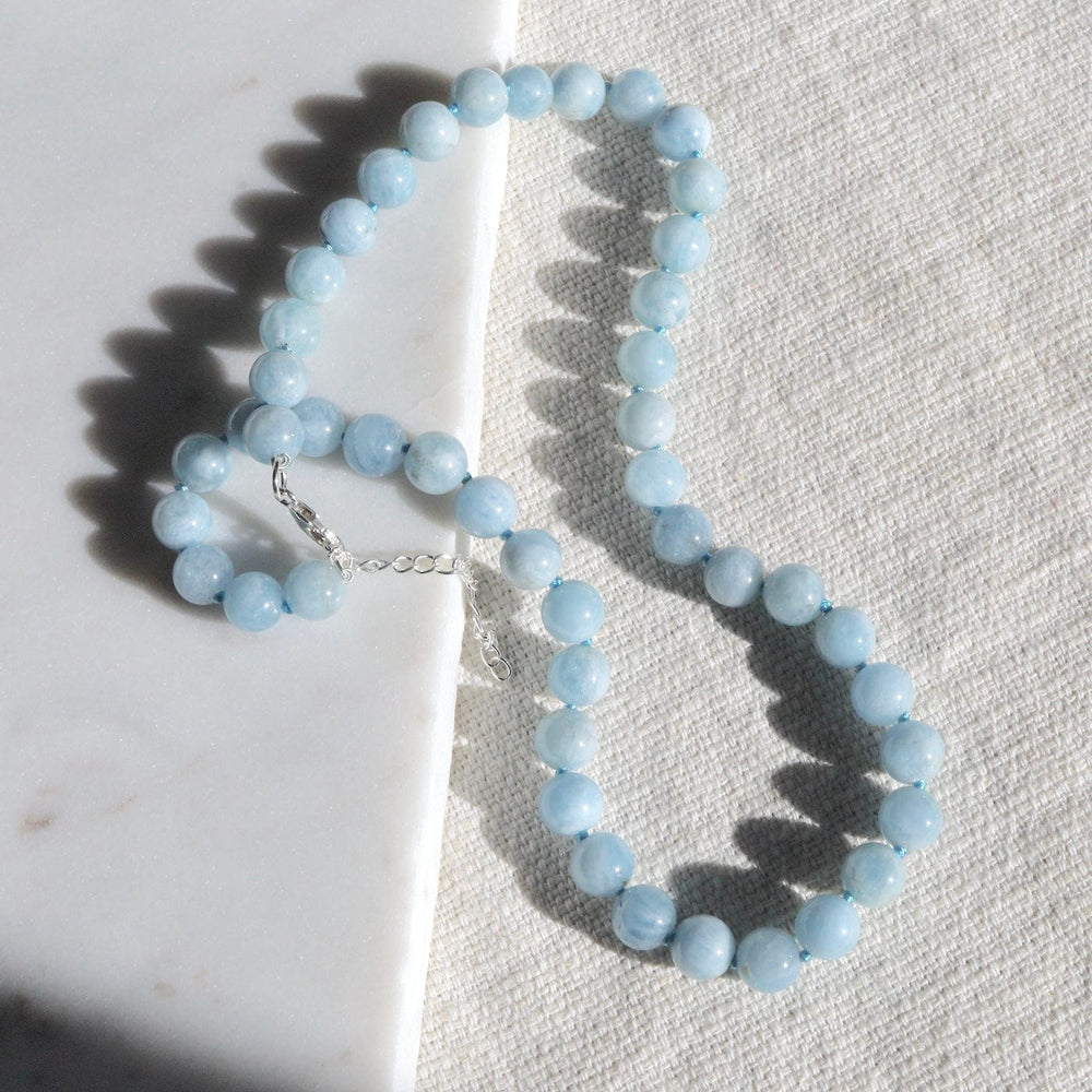 
                  
                    NKL Hand Knotted Milky Aquamarine Necklace
                  
                