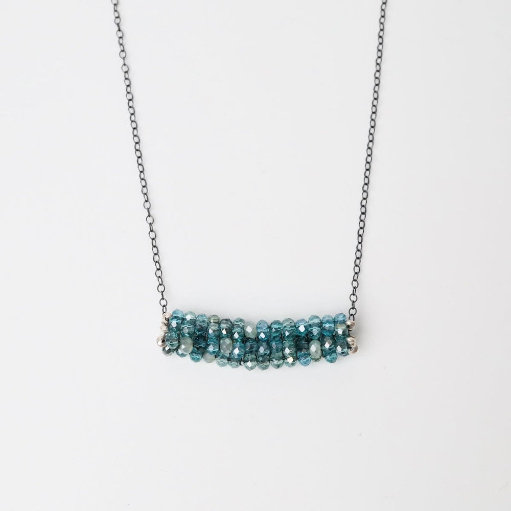 
                      
                        NKL Hand Stitched Mixed Aqua Crystals
                      
                    