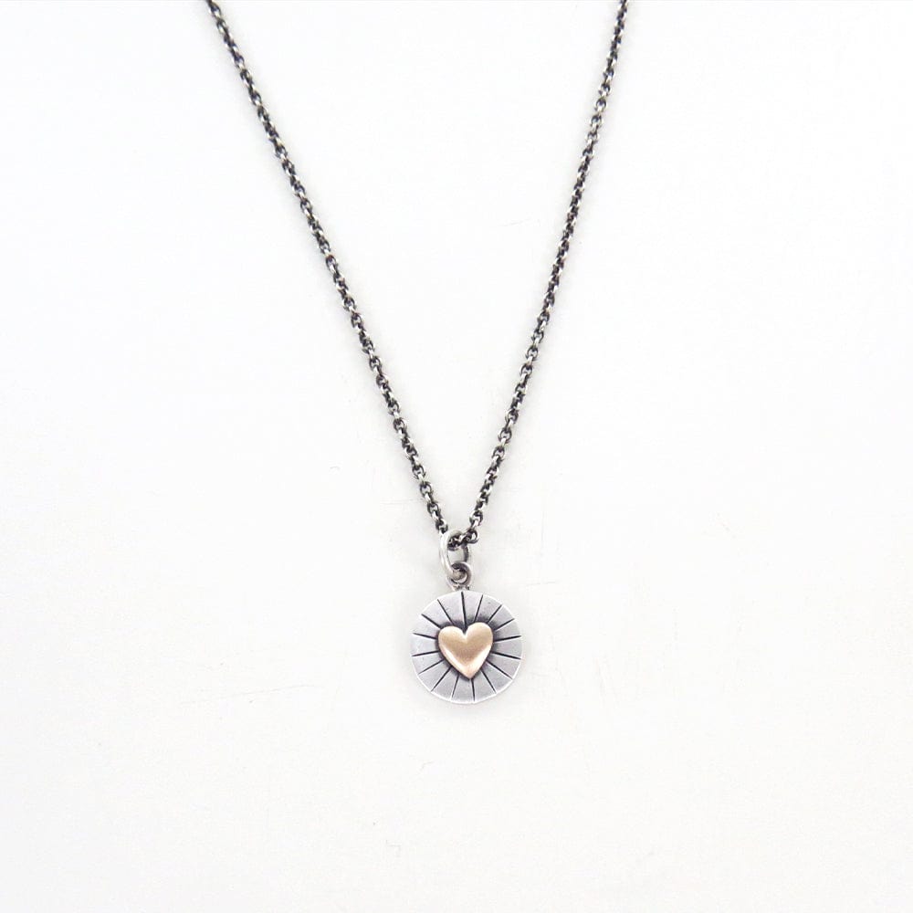 
                      
                        NKL HEART OF GOLD PENDANT
                      
                    