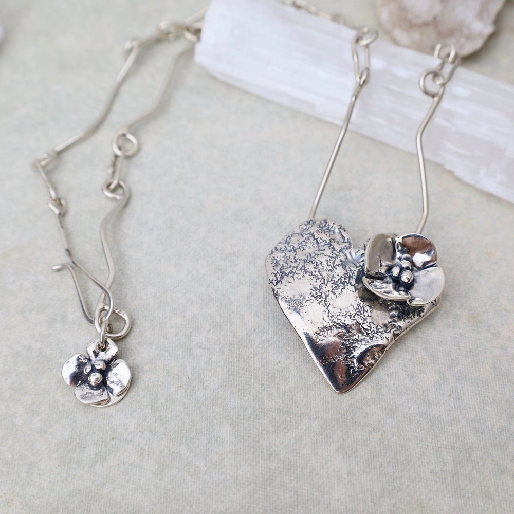 
                      
                        NKL Heart with Dogwood Flower Necklace
                      
                    