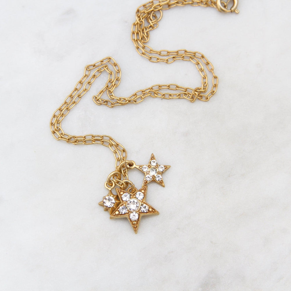 
                      
                        NKL-JM 3 Star Charm Necklace - Gold Plate
                      
                    