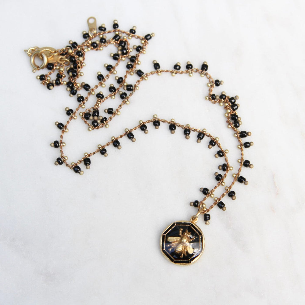 
                      
                        NKL-JM Black Enamel Bee Charm Necklace
                      
                    