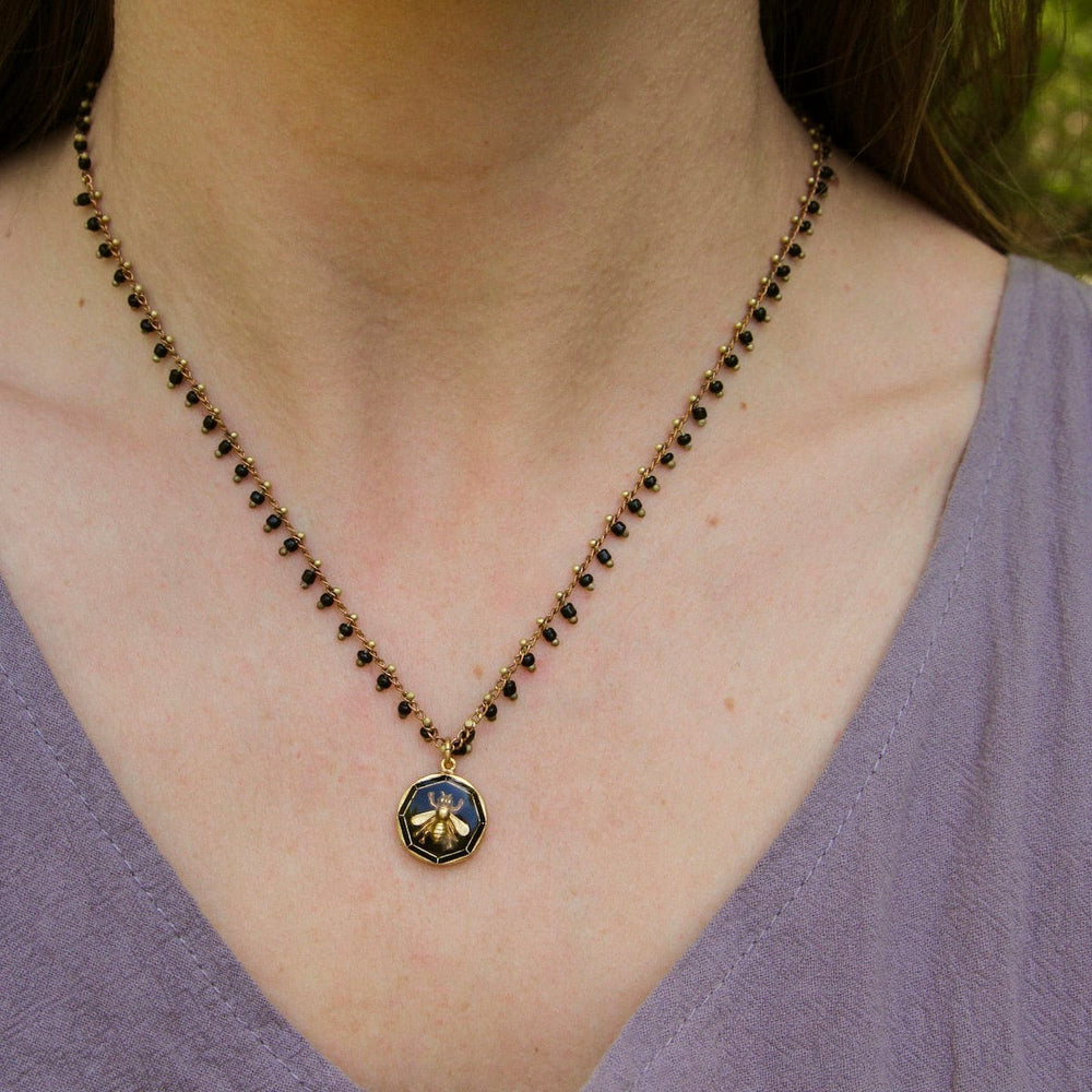 
                      
                        NKL-JM Black Enamel Bee Charm Necklace
                      
                    