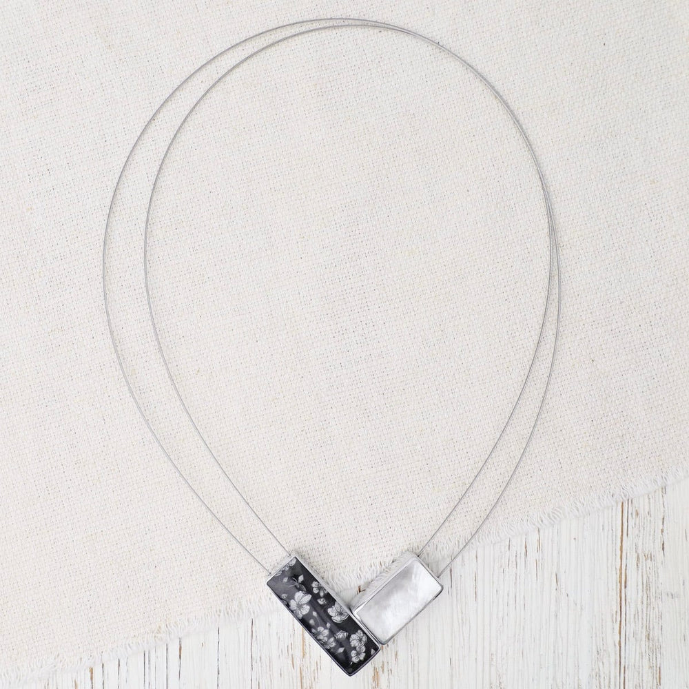 
                  
                    NKL-JM Black & White Kimono Magnetic V Pendant
                  
                