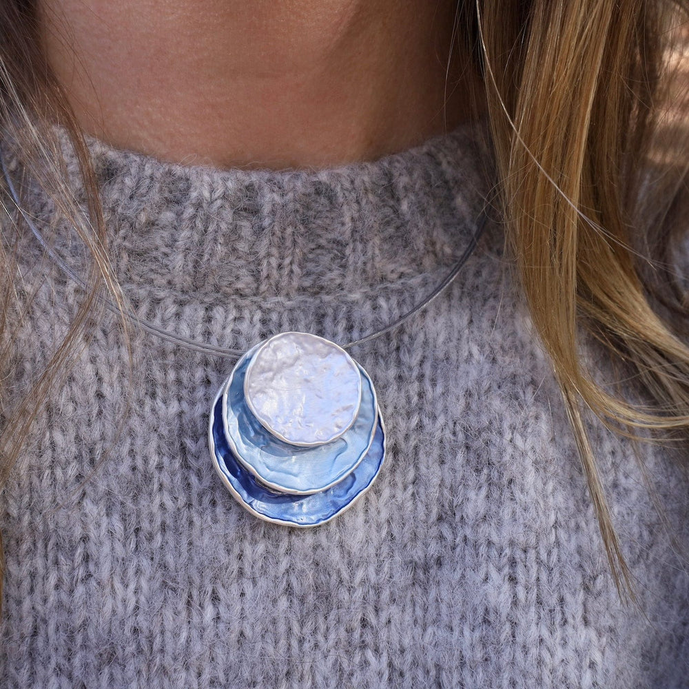 
                      
                        NKL-JM Blue Round Stack Pendant Necklace
                      
                    