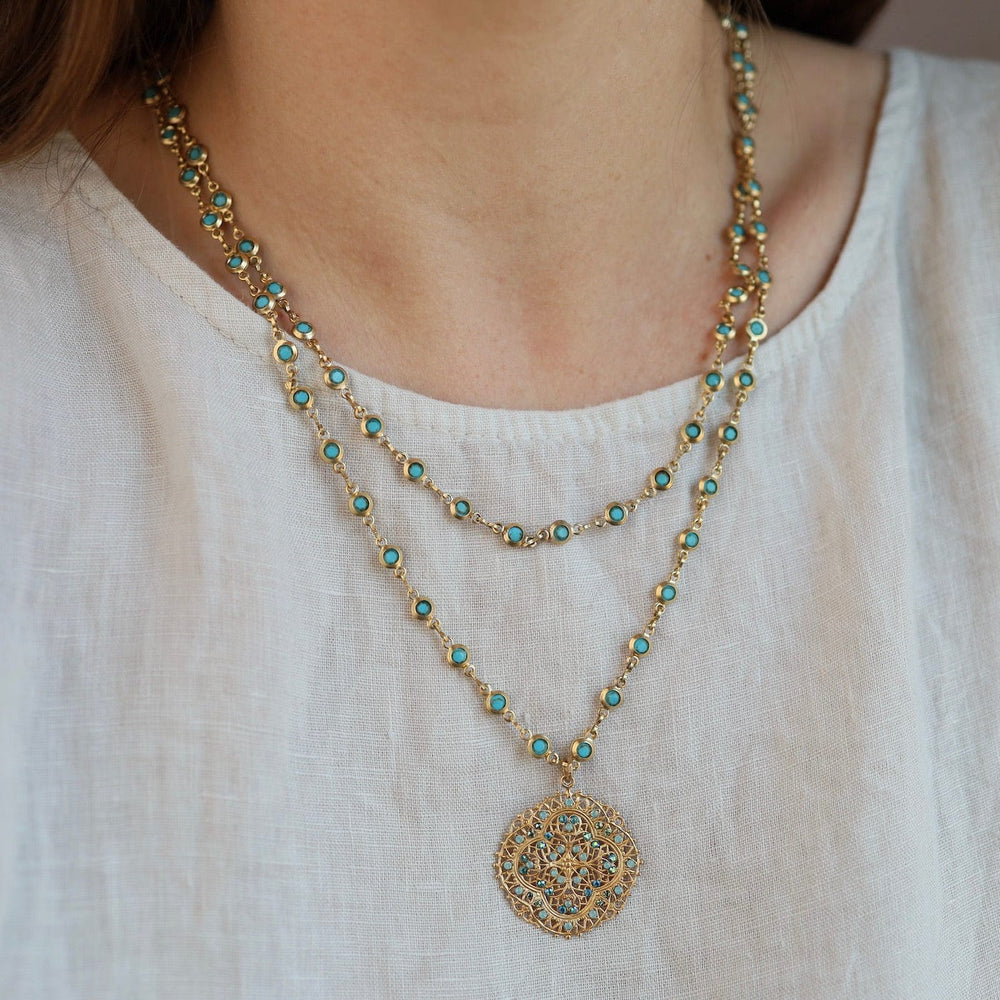 
                      
                        NKL-JM Crystal Medallion Necklace
                      
                    