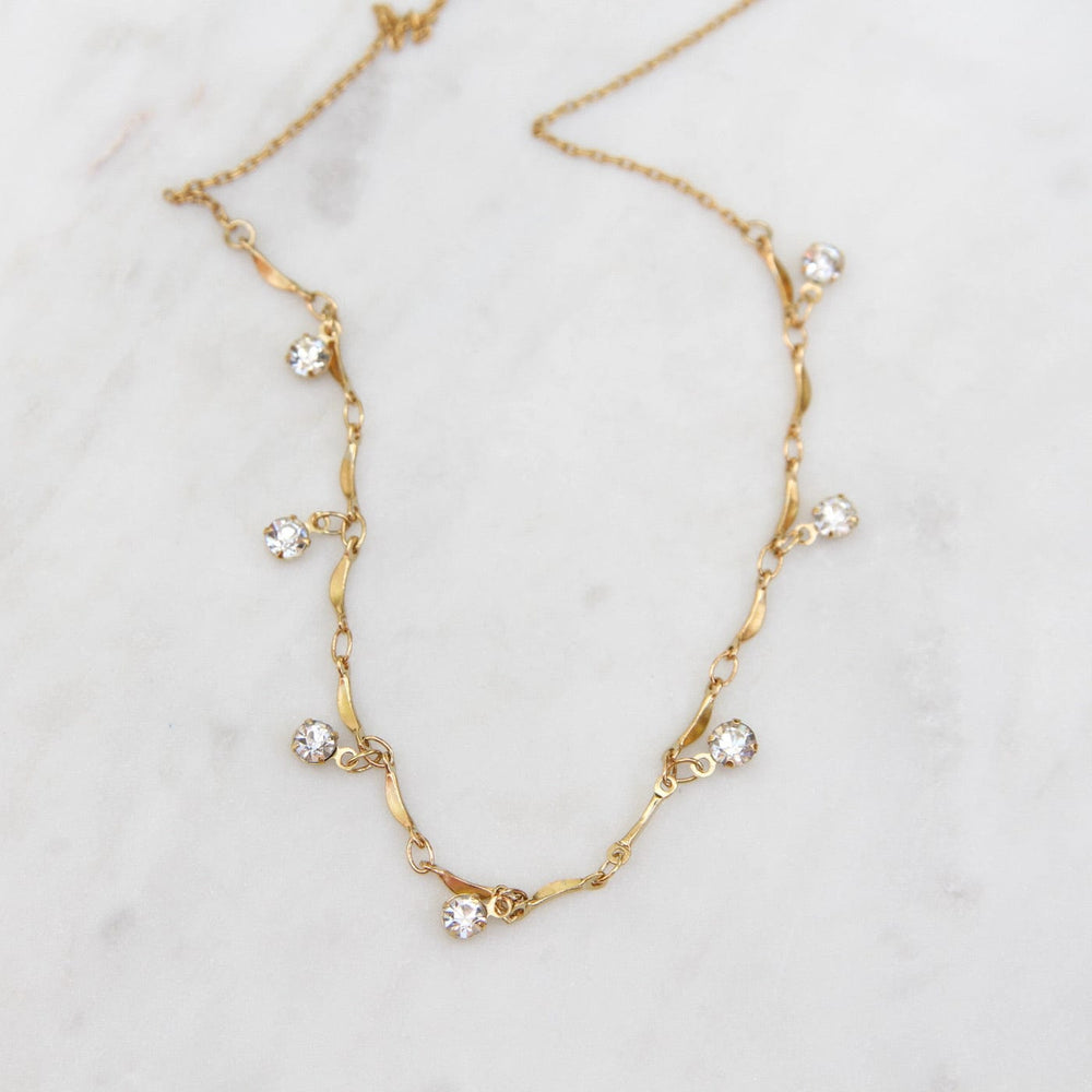 
                  
                    NKL-JM Delicate Crystal Scalloped Necklace - Gold Plate
                  
                