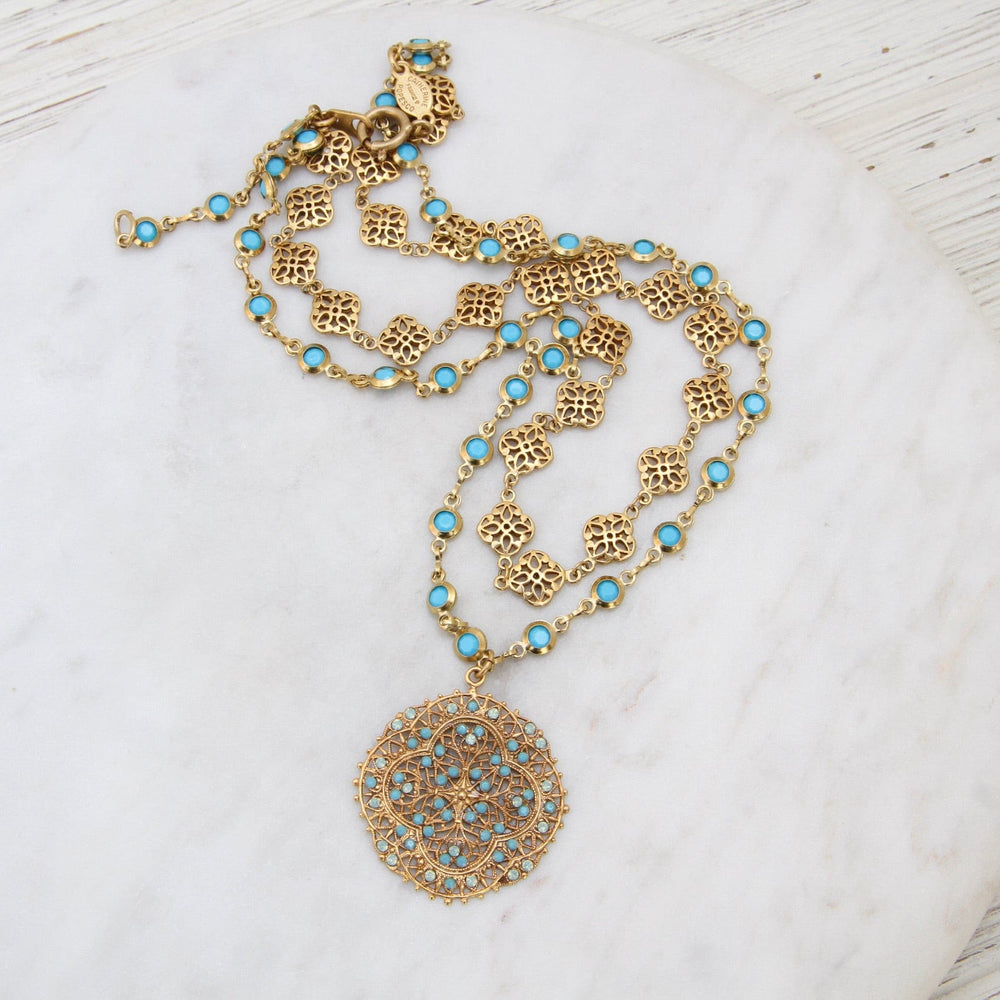 
                      
                        NKL-JM Double Strand Gold Filagree & Turquoise Crystal Bead Chain Necklace
                      
                    