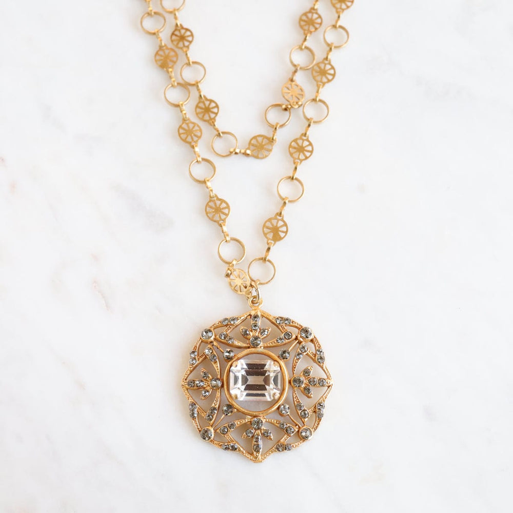 
                  
                    NKL-JM Gold Crystal Medallion Necklace
                  
                