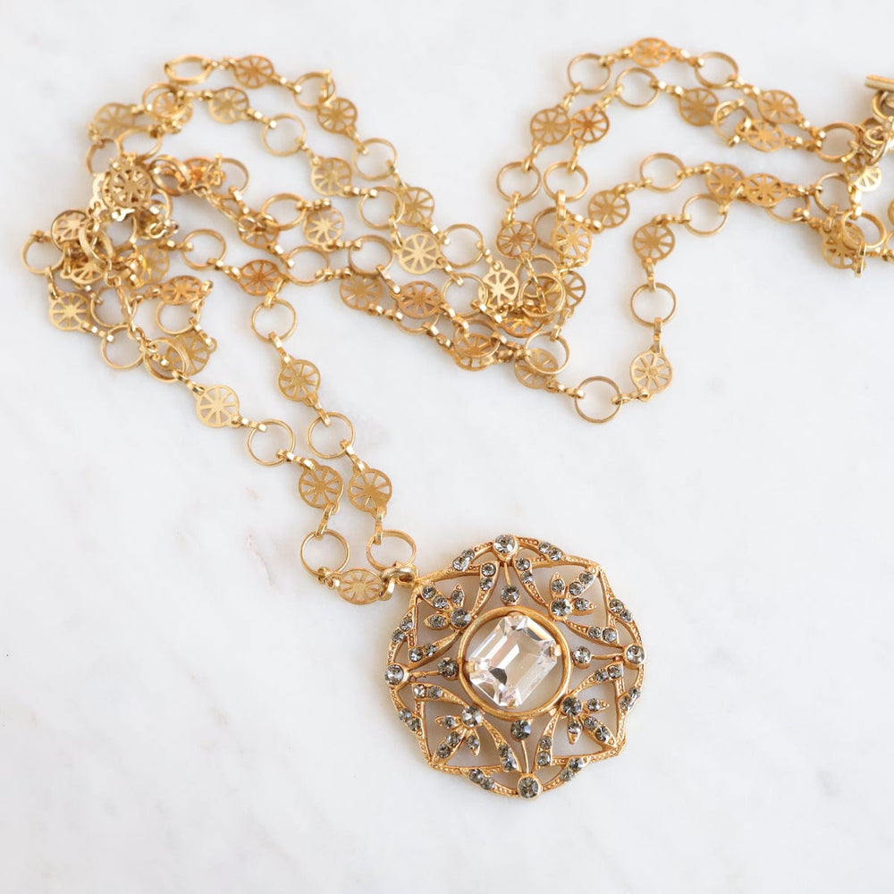 
                  
                    NKL-JM Gold Crystal Medallion Necklace
                  
                