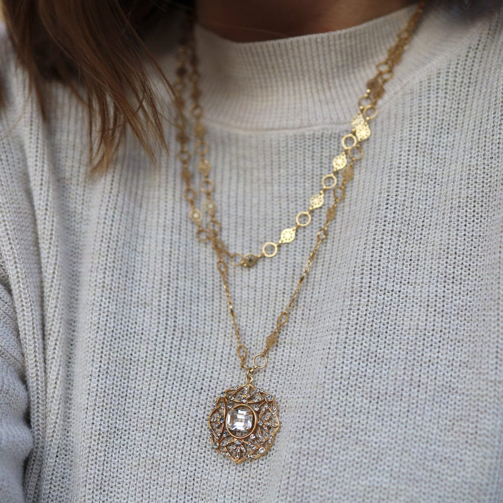 
                  
                    NKL-JM Gold Crystal Medallion Necklace
                  
                