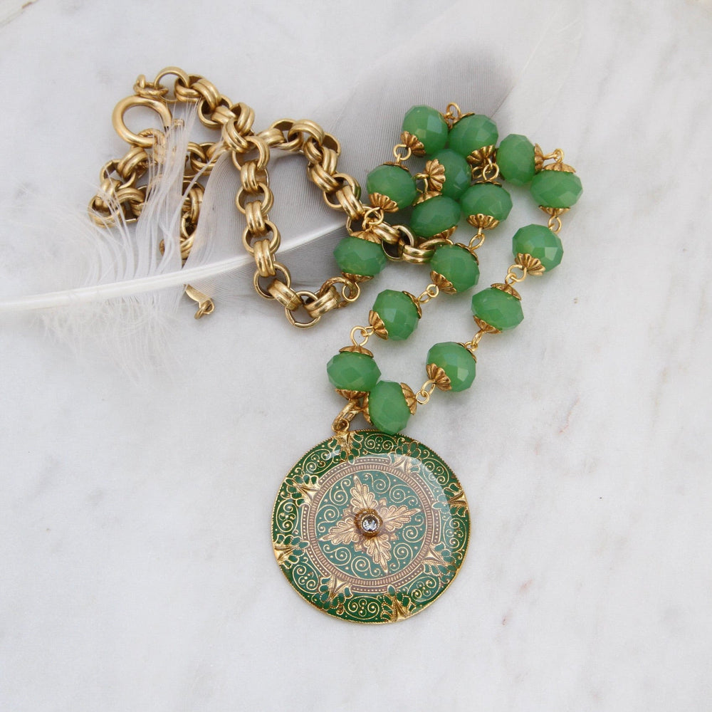 
                      
                        NKL-JM Green Enamel Madallion on Bead Chain - Gold Plate
                      
                    