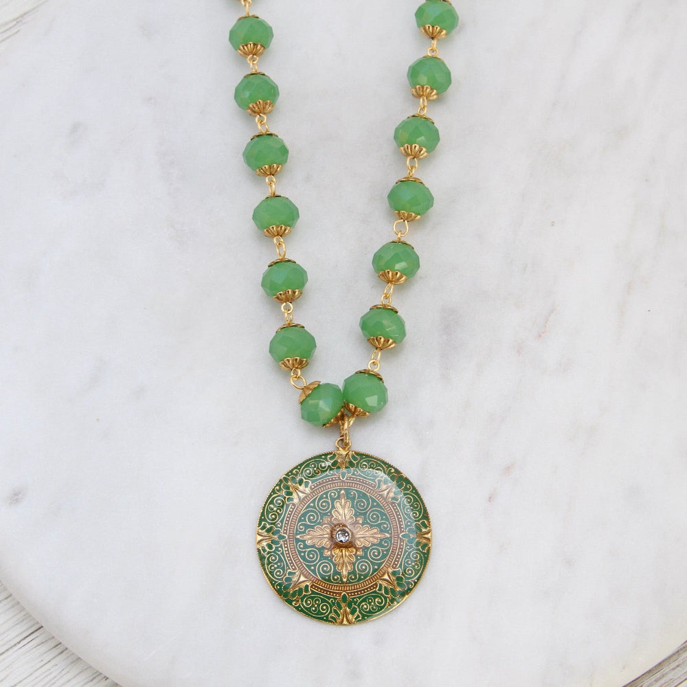 
                      
                        NKL-JM Green Enamel Madallion on Bead Chain - Gold Plate
                      
                    