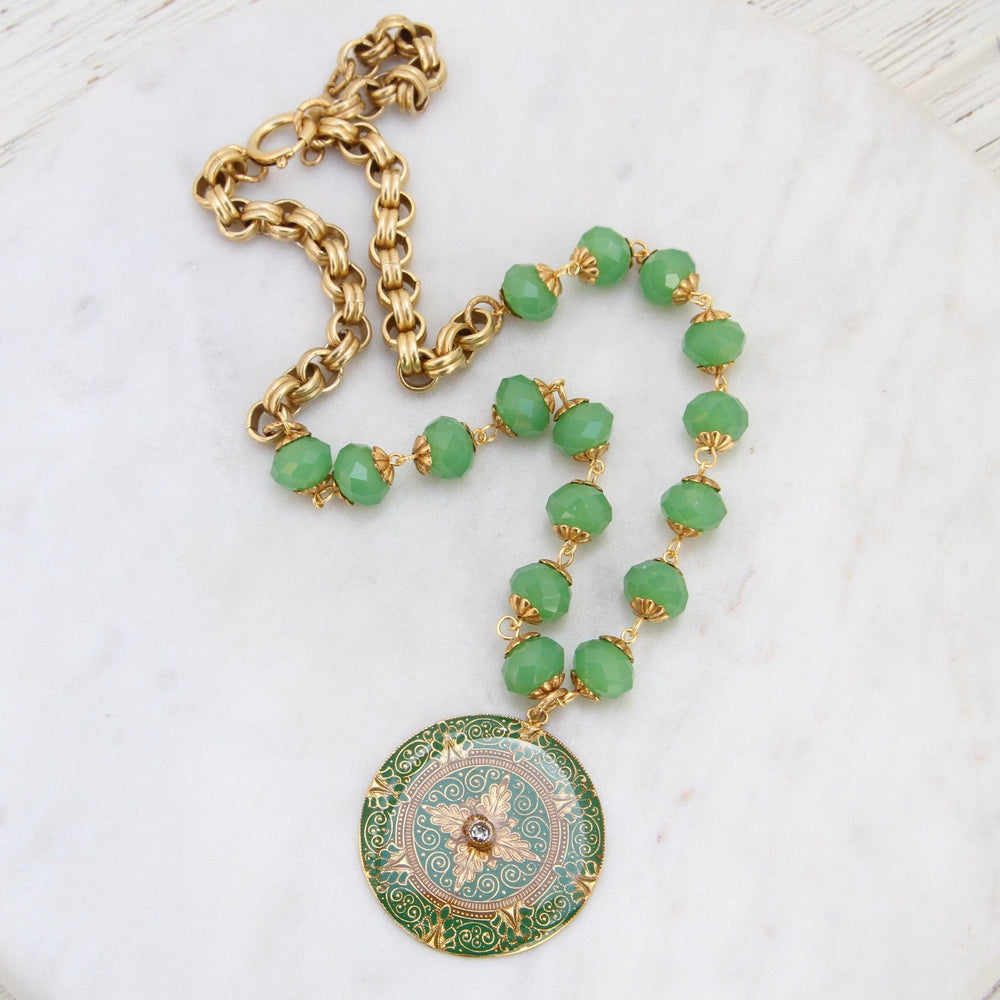 
                      
                        NKL-JM Green Enamel Madallion on Bead Chain - Gold Plate
                      
                    