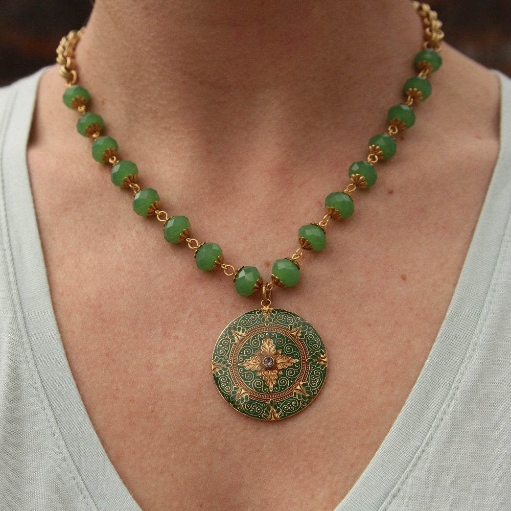 
                      
                        NKL-JM Green Enamel Madallion on Bead Chain - Gold Plate
                      
                    