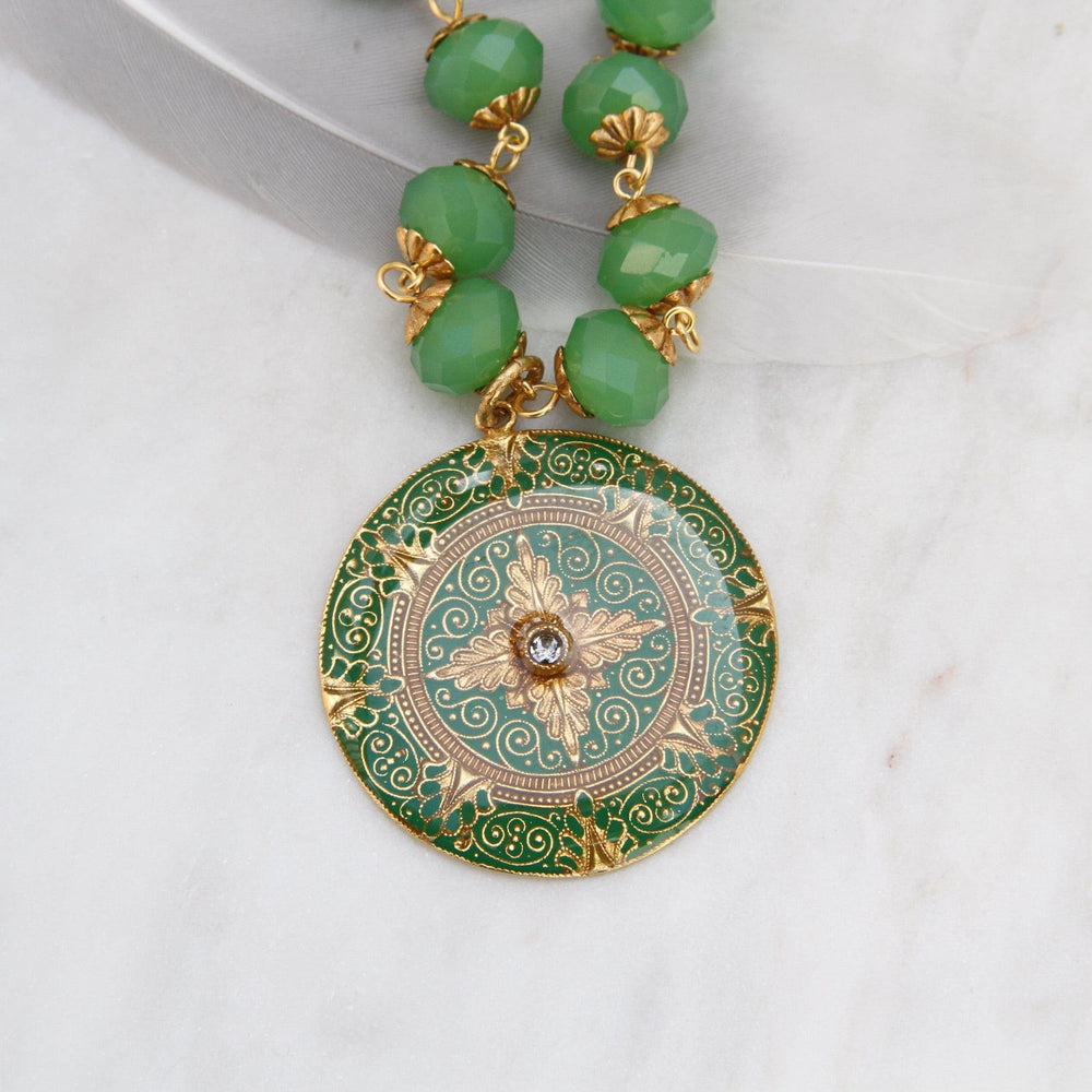 
                      
                        NKL-JM Green Enamel Madallion on Bead Chain - Gold Plate
                      
                    