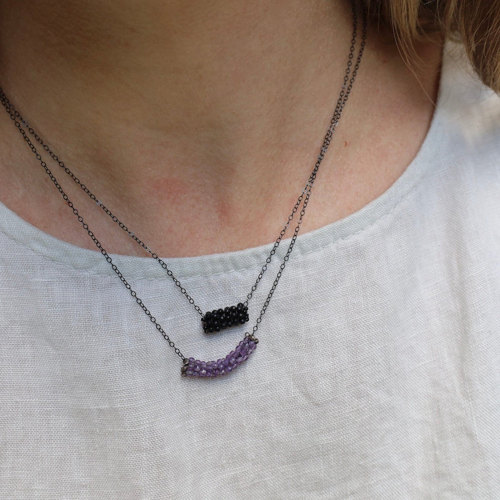 
                      
                        NKL-JM Hand Stitched Amethyst with Sterling Silver Trim Necklace
                      
                    