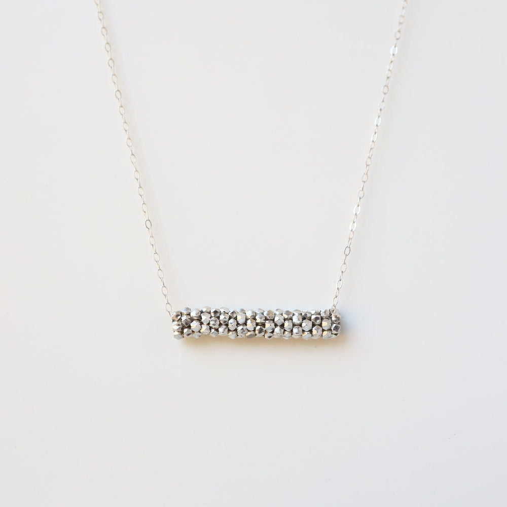 
                      
                        NKL-JM Hand Stitched Tiny Sterling Silver Cubes Necklace
                      
                    