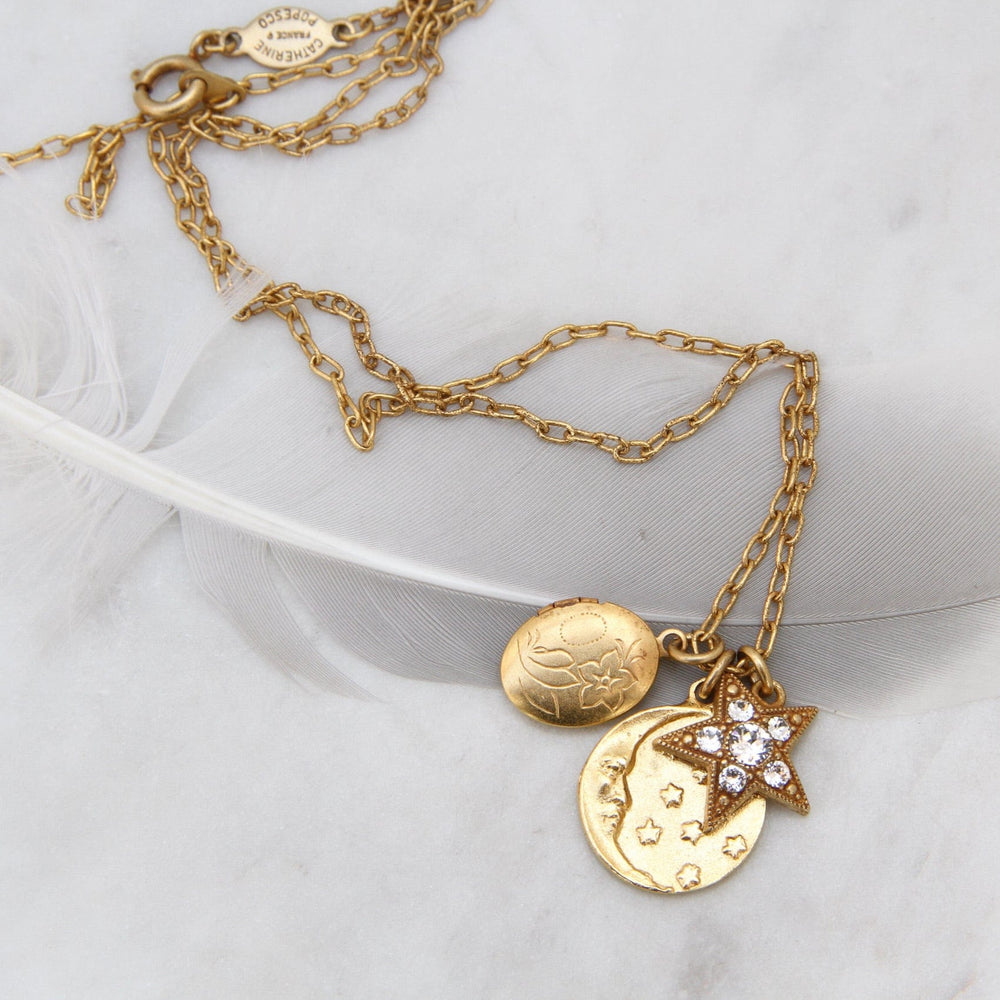 
                      
                        NKL-JM Moon, Star & Locket Charm Necklace - Gold Plate
                      
                    