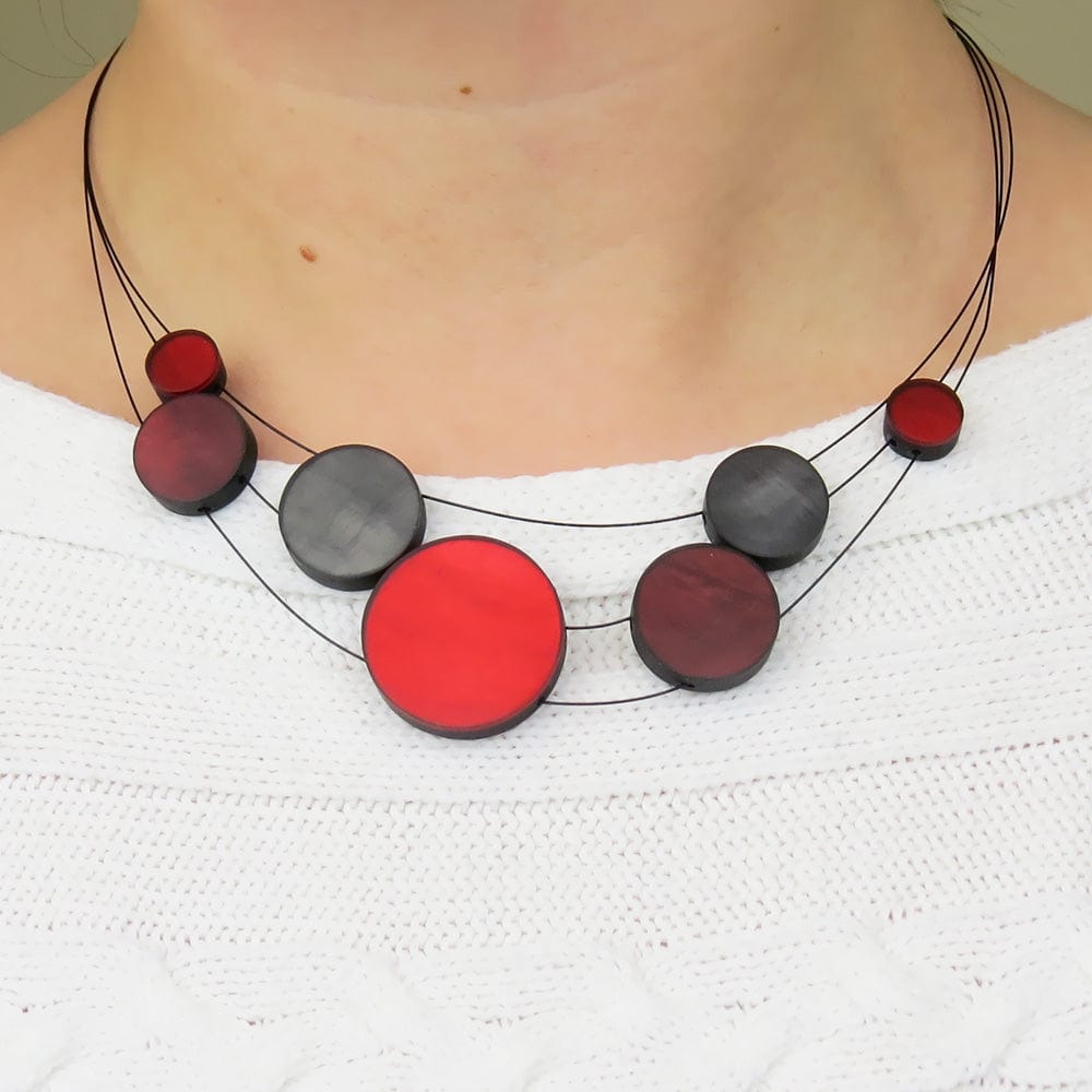 
                  
                    NKL-JM RED 3 STRAND DISK NECKLACE
                  
                