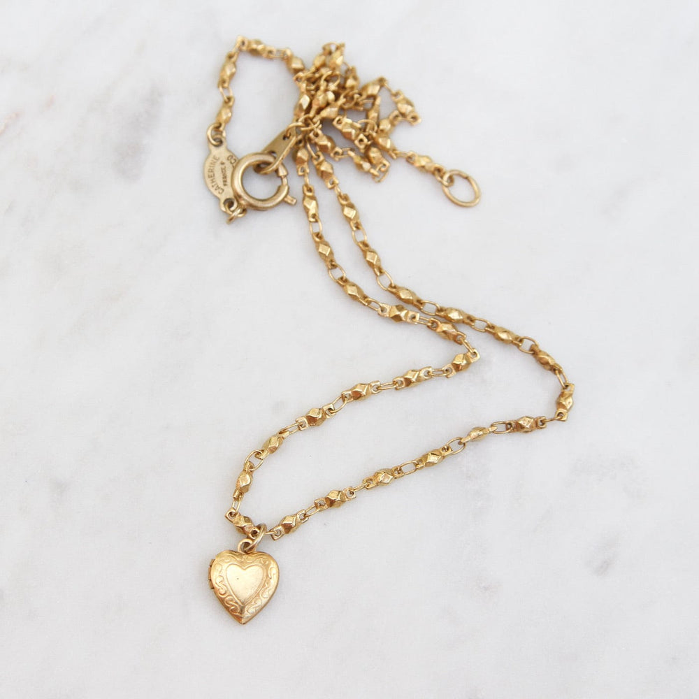 
                      
                        NKL-JM Small Heart Locket on Bead Link Chain - Gold Plate
                      
                    