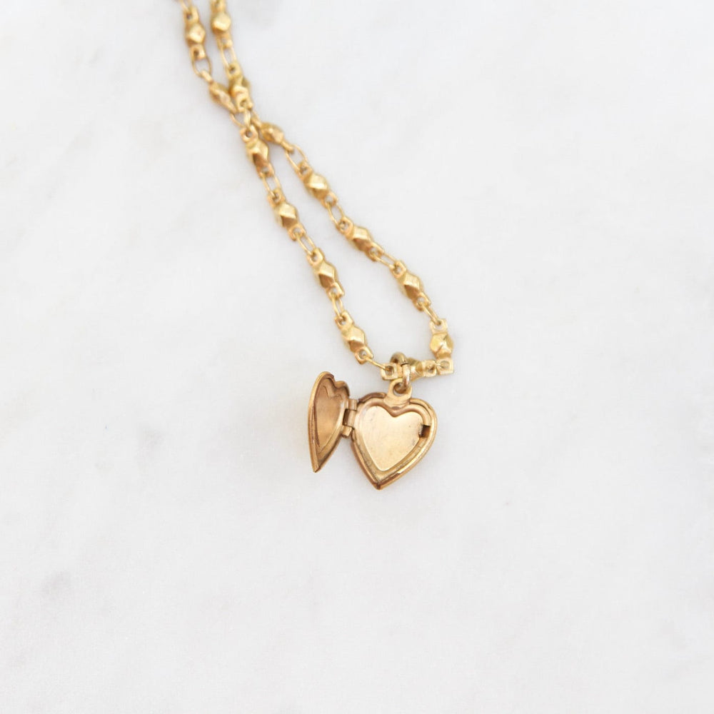 
                      
                        NKL-JM Small Heart Locket on Bead Link Chain - Gold Plate
                      
                    